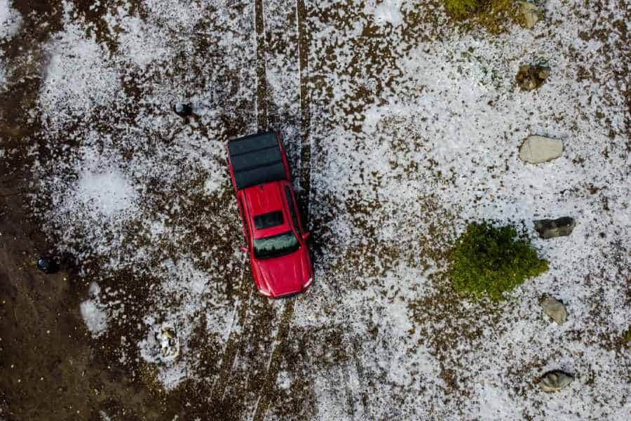 An aerial shot of a truck damaged by hail that will need an estimate for paintless dent repair.