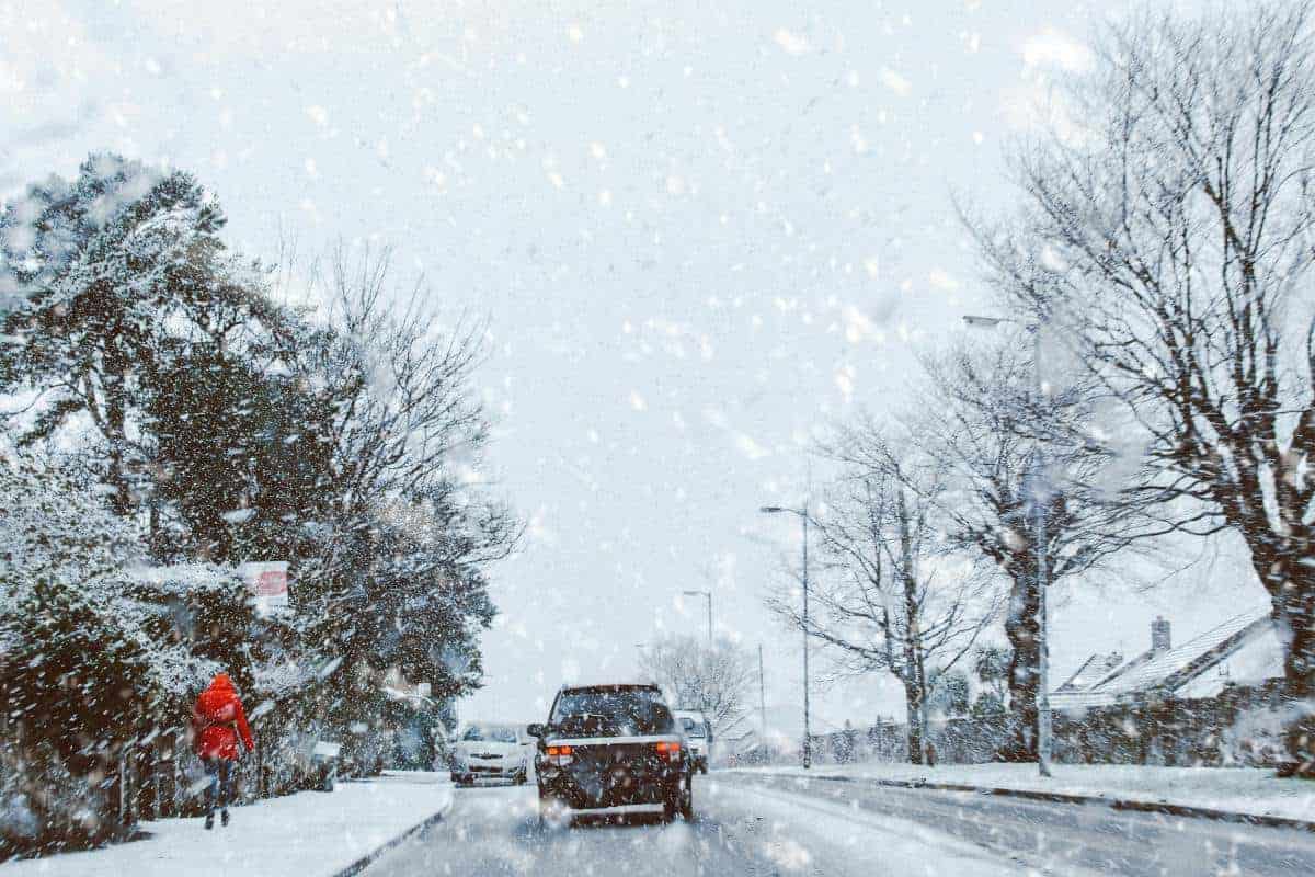 Freezing and Snowing Wheater and Some Cars on the Road